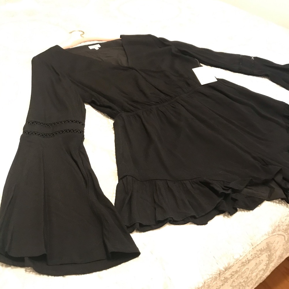 Black long sleeve romper NWT